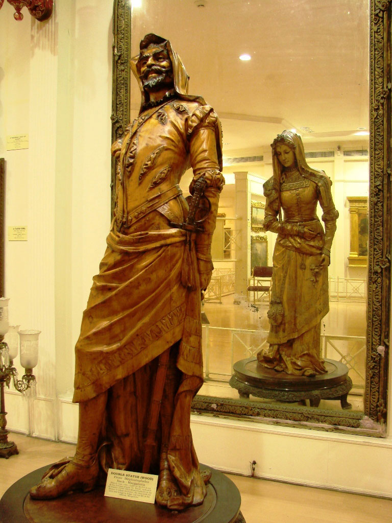  mephistopheles and margaretta; single block of sycamore/hare-wood, 19th century, france, sculptor unknown, salar jung museum, hyperabad 